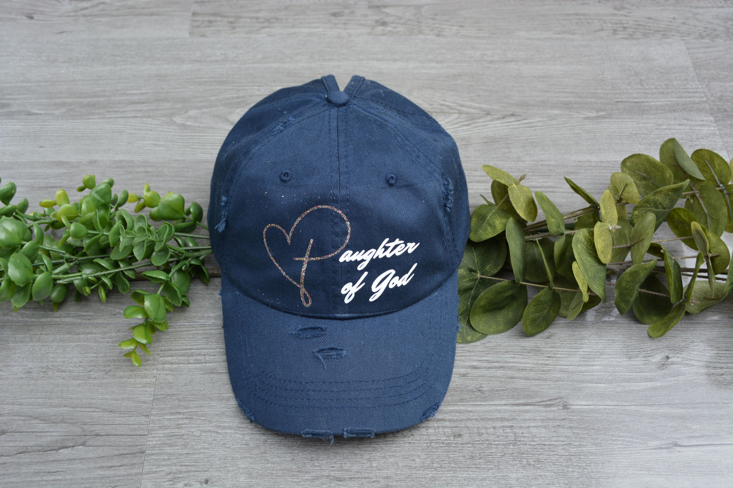 Blue hat with the Daughter of God Apparel logo